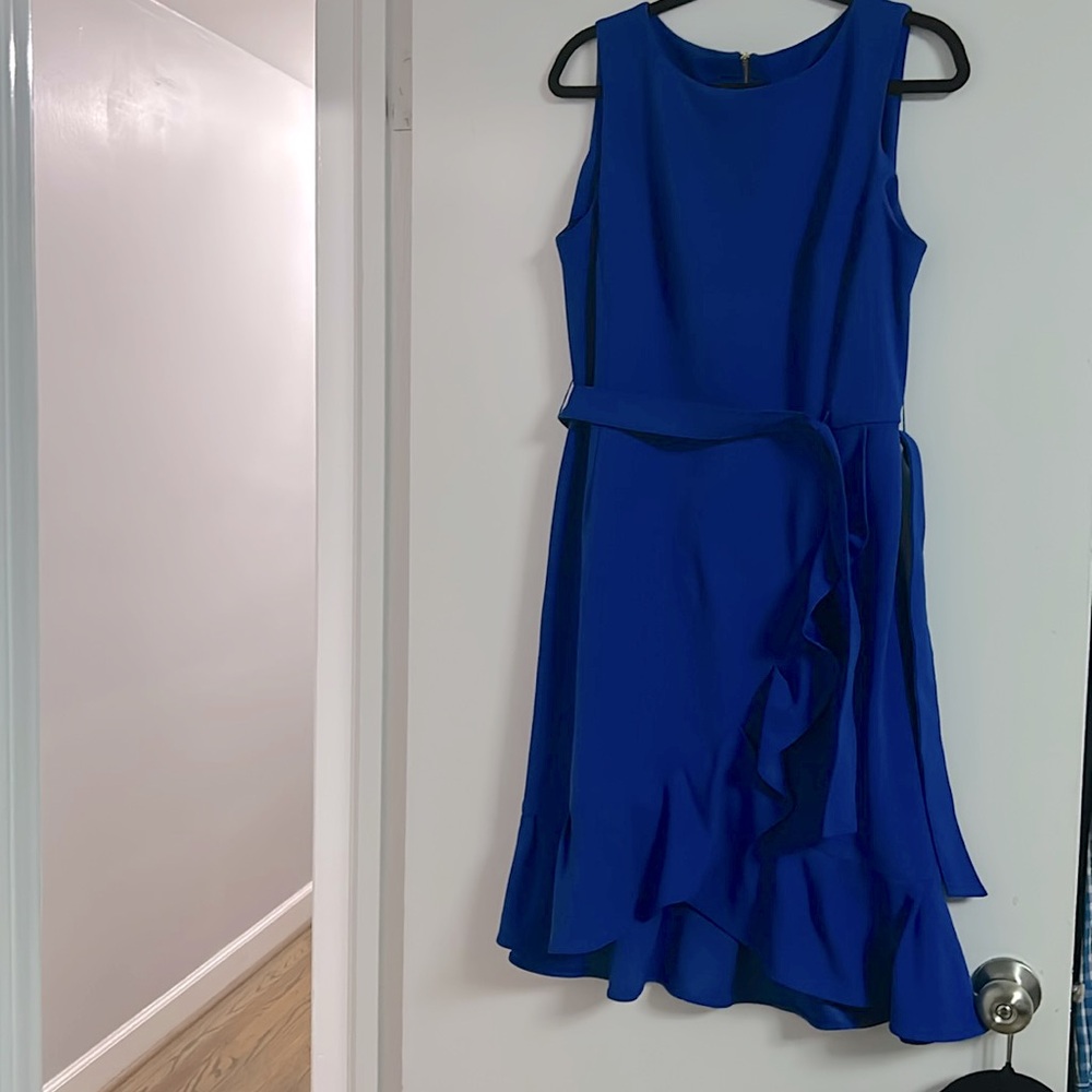 Calvin Klein cobalt blue ruffle bottom sleeveless dress. Tie belt, gold zipper.